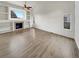 Spacious living room with hardwood floors and fireplace provides a clean and bright space at 5521 Spruce Ave, Castle Rock, CO 80104
