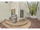 This backyard patio features a gas grill and a sliding glass door leading inside at 5129 Pasadena Way, Broomfield, CO 80023