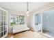 Bright, multi-purpose room with hardwood floors, natural light, and sliding door to the outside at 5129 Pasadena Way, Broomfield, CO 80023