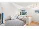 Spacious living area with vaulted ceilings, large window, and plush carpeting for a comfortable feel at 5129 Pasadena Way, Broomfield, CO 80023
