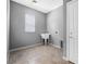 Functional laundry room with a wash basin, tile flooring, and natural light creating a convenient space at 6932 E 133Rd Ave, Thornton, CO 80602