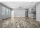 Spacious living area boasts hardwood floors, neutral palette, and plenty of natural light at 6932 E 133Rd Ave, Thornton, CO 80602