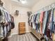 Walk-in closet with ample hanging storage and carpeted floors at 8522 S Dudley St, Littleton, CO 80128