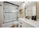 Contemporary bathroom with a marble-tiled shower, modern vanity, and sleek black fixtures at 1099 Thornbury Pl, Highlands Ranch, CO 80129