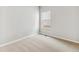 Bright bedroom featuring neutral carpet and natural light from a single window at 770 Twining Ave, Brighton, CO 80601