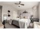 A neutral colored Main bedroom with a vaulted ceiling, carpet, and a comfy-looking bed at 4873 S Fultondale Way, Aurora, CO 80016