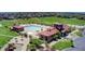 Aerial view of community pool, recreation area, and clubhouse surrounded by homes at 25 N Irvington St, Aurora, CO 80018