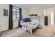 Bedroom featuring a metal frame bunk bed with neutral walls and carpet at 25 N Irvington St, Aurora, CO 80018