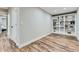 Bonus room in basement with modern shelving and ample space for storage or display at 25 N Irvington St, Aurora, CO 80018