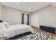 Bedroom with light walls, modern rug, and closet storage at 25 N Irvington St, Aurora, CO 80018