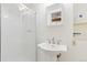 Bathroom with a pedestal sink, and a glass-doored shower at 2251 Cliffrose Ln, Louisville, CO 80027