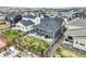 Aerial view of the backyard, showcasing a fenced yard and patio area perfect for outdoor entertaining at 2144 Coyote Mint Dr, Monument, CO 80132