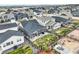 Backyard aerial view showcasing a patio area, fenced yard, and well-maintained landscaping at 2144 Coyote Mint Dr, Monument, CO 80132
