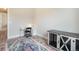Bright bedroom featuring a white desk, black chair, and decorative display cabinet at 2144 Coyote Mint Dr, Monument, CO 80132