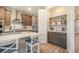 Stylish kitchen with stainless steel appliances, white countertops, and a pantry at 2144 Coyote Mint Dr, Monument, CO 80132