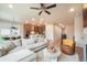 Bright and open living space seamlessly connects to the kitchen and dining area, perfect for entertaining at 2144 Coyote Mint Dr, Monument, CO 80132