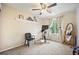 Bedroom featuring neutral walls, carpet, a window, and exercise equipment at 4982 S Danube St, Aurora, CO 80015