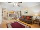 Open living room featuring hardwood floors with easy access to the kitchen at 4982 S Danube St, Aurora, CO 80015