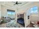 Bedroom featuring a fun tent over the bed, a comfortable chair, and a cozy carpet at 1757 Whistlepig Ln, Broomfield, CO 80020