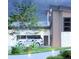 Exterior elevation with illuminated walkway and garage access at 1757 Whistlepig Ln, Broomfield, CO 80020