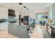 Modern kitchen features a large island, stainless steel appliances, and stylish cabinetry with ample storage at 1757 Whistlepig Ln, Broomfield, CO 80020