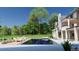 Backyard features a spacious pool, surrounding patio, and luxurious lounge seating at 1757 Whistlepig Ln, Broomfield, CO 80020