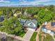 Aerial view of the home showcasing its manicured lawn, beautiful landscaping and mountain views at 379 Lincoln Ct, Louisville, CO 80027