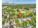 Aerial view of a property showcasing its location near a park and neighborhood amenities at 379 Lincoln Ct, Louisville, CO 80027
