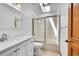Bathroom with skylight, shower and tub combo at 379 Lincoln Ct, Louisville, CO 80027