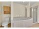 Relax in this bath featuring a soaking tub with tile surround and a glass enclosed shower at 379 Lincoln Ct, Louisville, CO 80027