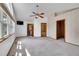 This spacious primary bedroom offers a ceiling fan, natural light, and an en suite bath and closet at 379 Lincoln Ct, Louisville, CO 80027