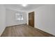 Bedroom featuring hardwood floors, natural light and a closet at 379 Lincoln Ct, Louisville, CO 80027