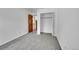 This bedroom features neutral carpeting and a closet providing storage space at 379 Lincoln Ct, Louisville, CO 80027