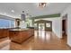 Open-concept kitchen featuring a central island, hardwood floors and modern finishes at 379 Lincoln Ct, Louisville, CO 80027