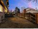 The property includes a wood deck for entertaining and a large backyard with privacy fence at 2090 S Gray Dr, Lakewood, CO 80227