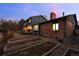 Backyard with potential garden beds and a view of the rear of the house at 2090 S Gray Dr, Lakewood, CO 80227
