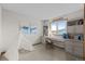 Charming bedroom features a built-in desk, shelving, and decorative teepee at 2090 S Gray Dr, Lakewood, CO 80227