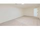 Finished basement with carpeted floors and recessed lighting, ready for customization at 14317 Olmsted Dr, Denver, CO 80239