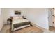 Comfortable bedroom features neutral decor, a large window, and a minimalist design at 14317 Olmsted Dr, Denver, CO 80239