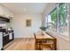 Eat-in kitchen featuring stainless steel appliances and ample counter space at 14317 Olmsted Dr, Denver, CO 80239