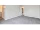 Spacious bedroom with neutral walls and plush carpeting at 12148 E Kepner Pl, Aurora, CO 80012