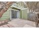 Cozy patio with a sliding glass door, concrete pad, and access to the back of the property at 12148 E Kepner Pl, Aurora, CO 80012