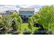 Backyard view featuring a spacious deck and patio for outdoor relaxation at 16671 E Prairie Goat Ave, Parker, CO 80134