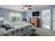 Spacious bedroom with large window and closet and ensuite bath at 16671 E Prairie Goat Ave, Parker, CO 80134