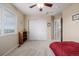 Bedroom with carpet, ceiling fan, and closet with plenty of space at 16671 E Prairie Goat Ave, Parker, CO 80134