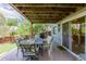 Outdoor patio with comfortable seating and backyard view at 16671 E Prairie Goat Ave, Parker, CO 80134