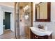 Bathroom with a glass-enclosed shower, modern fixtures, and a sleek vanity at 16 N Pennsylvania St, Denver, CO 80203