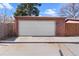 A detached one car garage with a secure ADT security system, situated in a residential area at 16 N Pennsylvania St, Denver, CO 80203