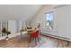 Well-lit office space with modern decor, wood floors, and a bright window view at 16 N Pennsylvania St, Denver, CO 80203
