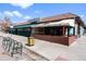 Charming restaurant with outdoor seating, awning, and tile roof, located in a neighborhood setting at 16 N Pennsylvania St, Denver, CO 80203